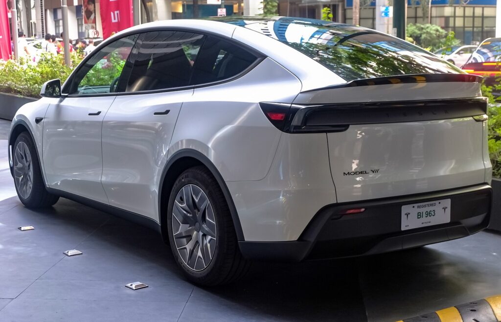 Tesla Model Y L Pearl White Multi-Coat rear view