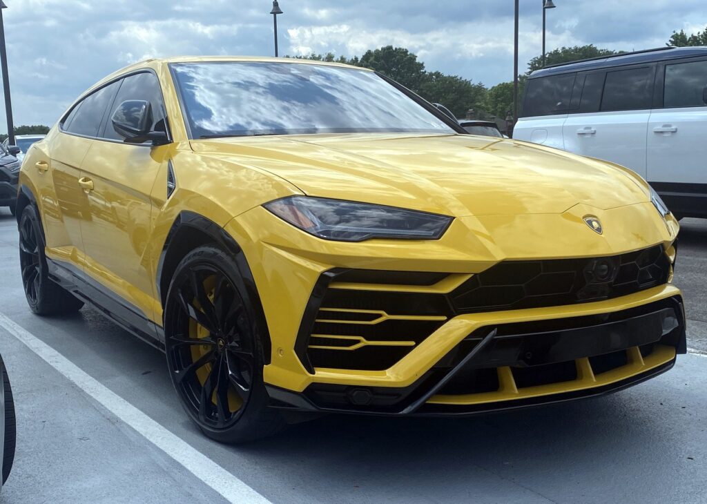 Yellow Lamborghini Urus front three-quarter view