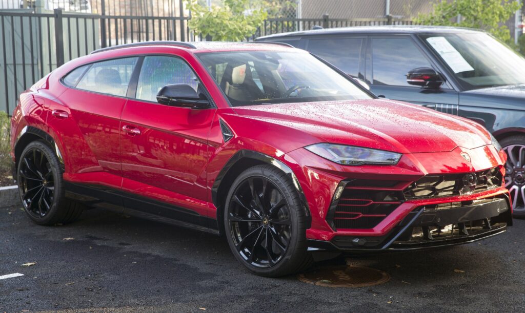 Red Lamborghini Urus front three-quarter view