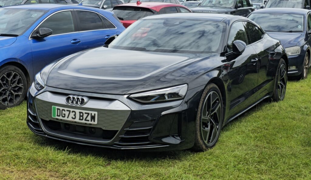 Audi e-tron GT front three-quarter view for Porsche Taycan comparison