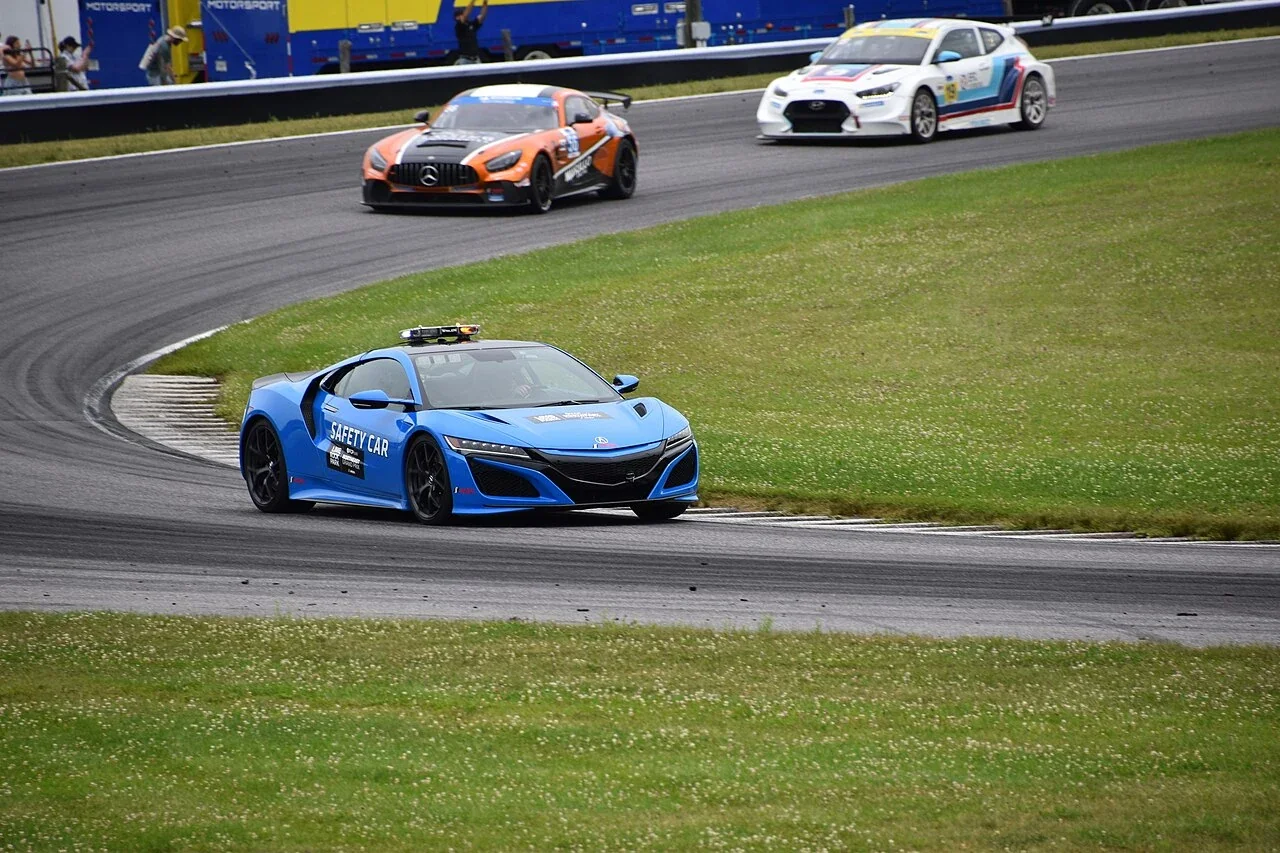 Acura NSX safety car rounding a bend