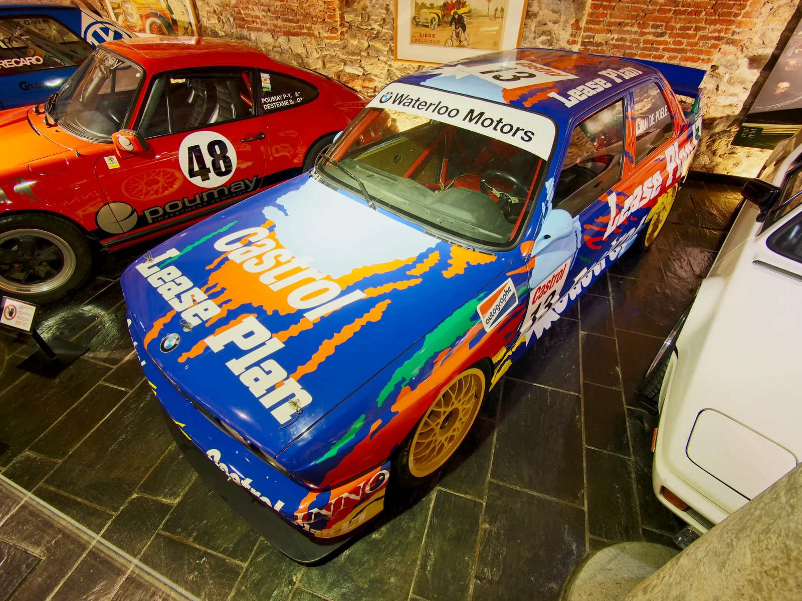 1992 BMW E30 M3 race car photographed in a motorsport museum