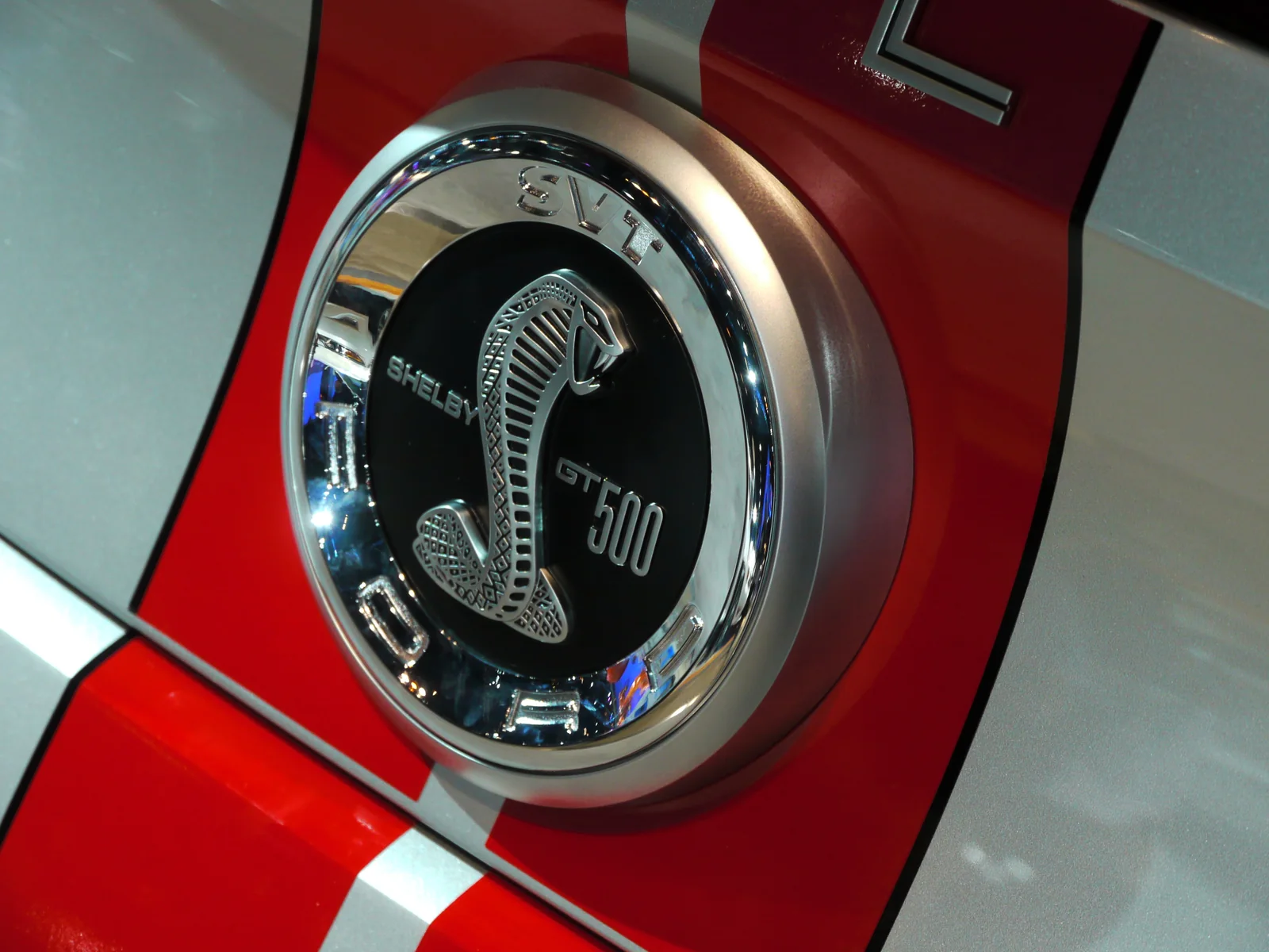 Shelby Cobra badge close-up with a cobra snake emblem