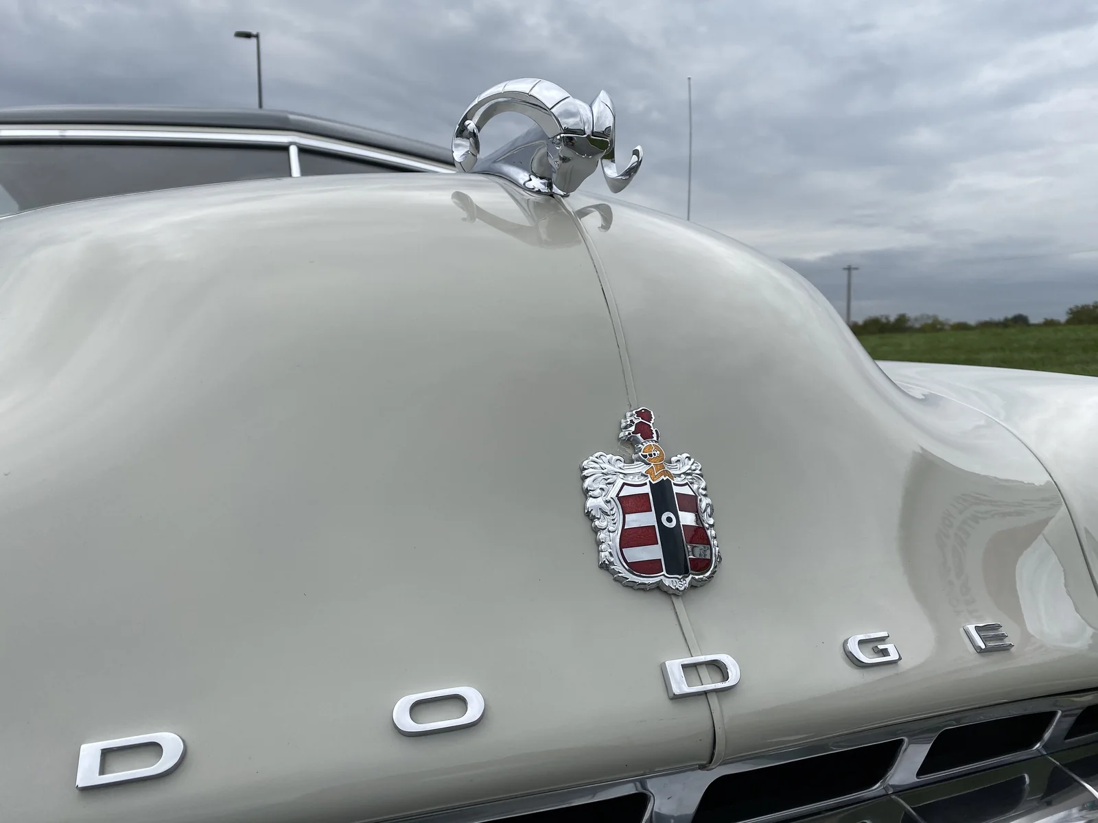 classic Dodge hood ornament showing a ram head symbol