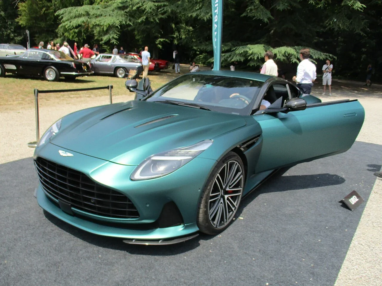 Aston Martin DB12 coupe with door open