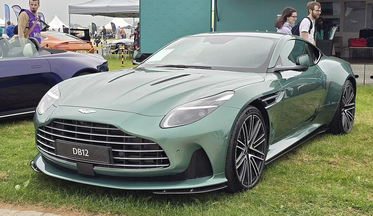 Green Aston Martin DB12 fixed-roof coupe