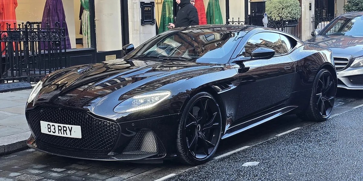 Black Aston Martin DBS Superleggera front three-quarter
