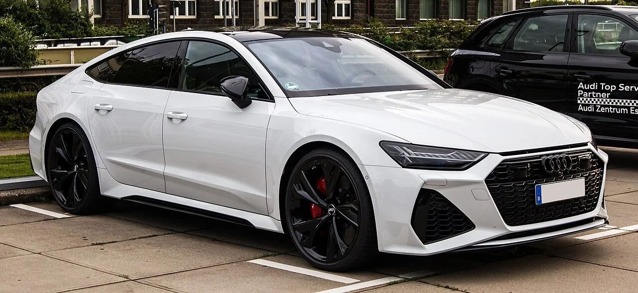 White early C8 Audi RS 7 front quarter