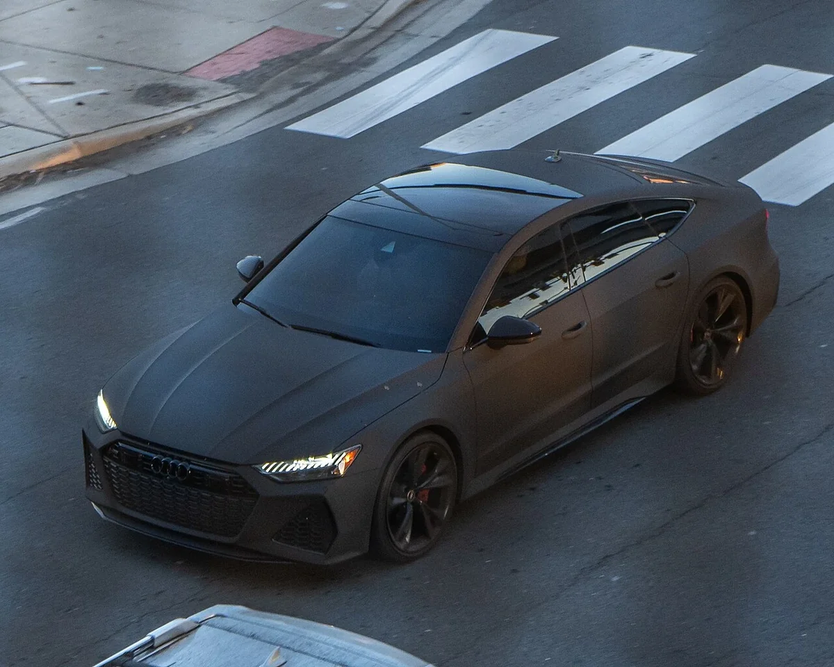 Dark C8 Audi RS 7 viewed from above