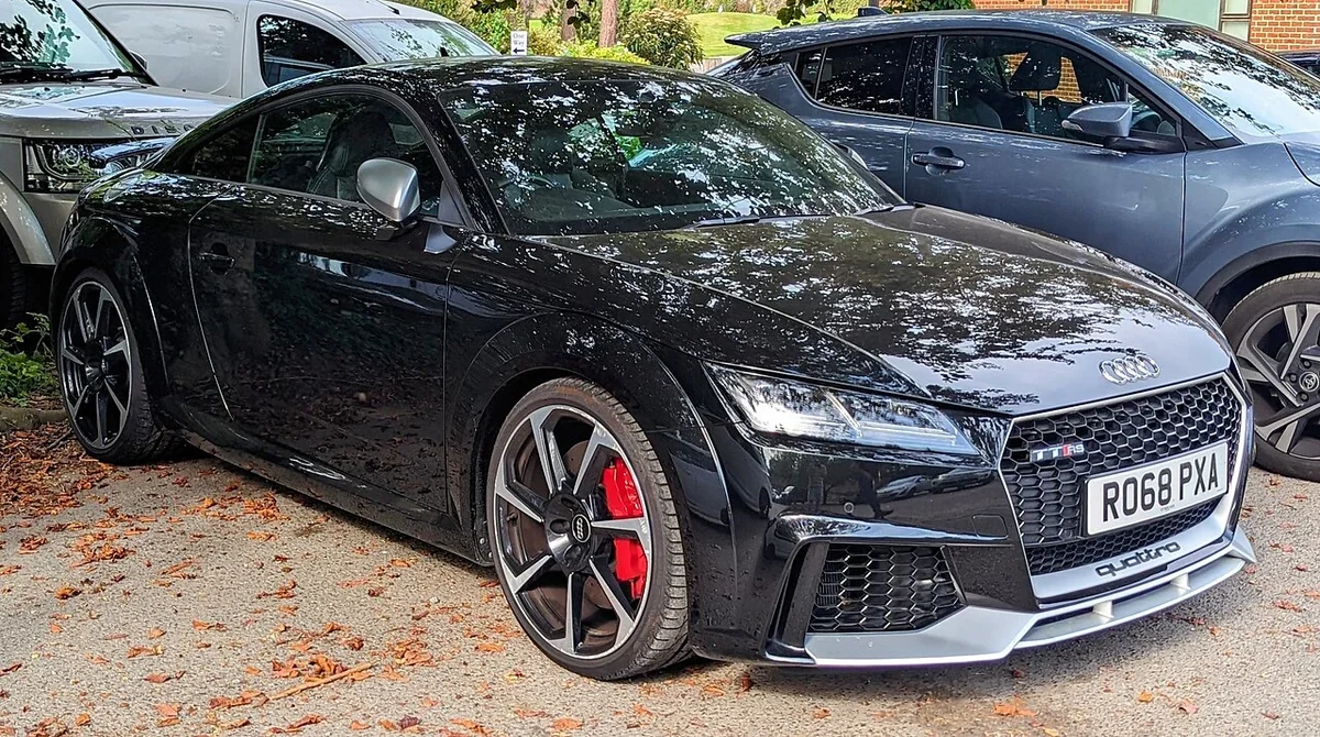 Early 8S TT RS front three-quarter view; transmission specifications are established by the linked manufacturer documentation.