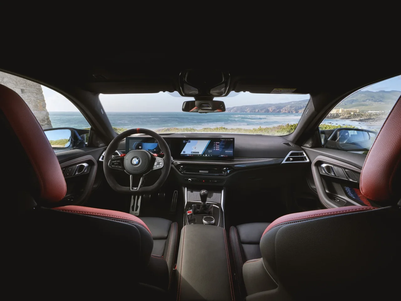 BMW M2 cabin viewed from behind the front seats