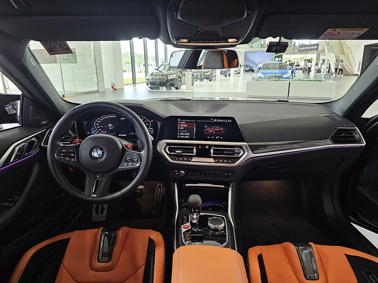 Early BMW M4 Competition dashboard and controls