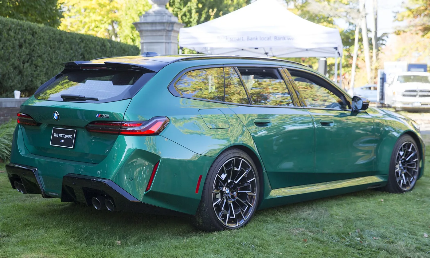 2025 BMW M5 Touring in Isle of Man Green, rear right