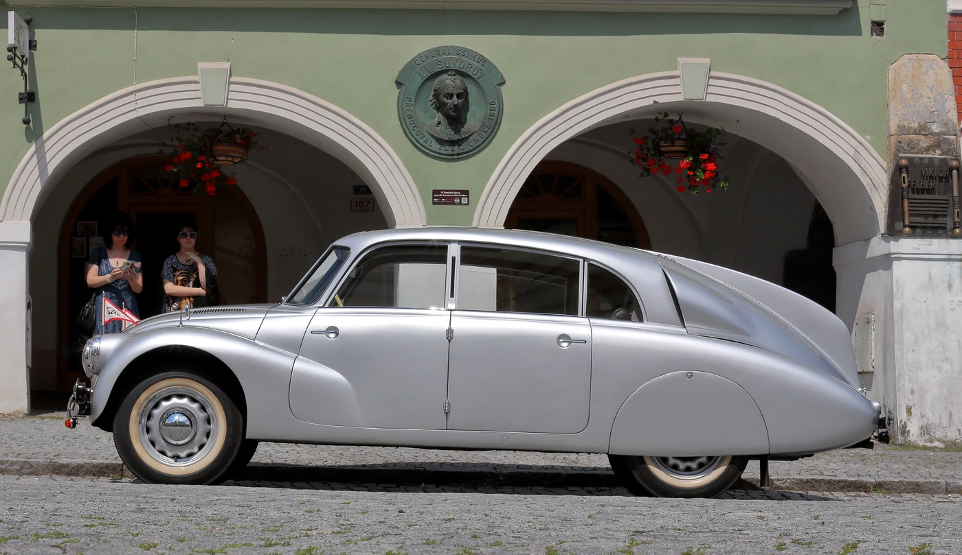 Silver Tatra 87 with an integrated rounded body and long tapering rear profile