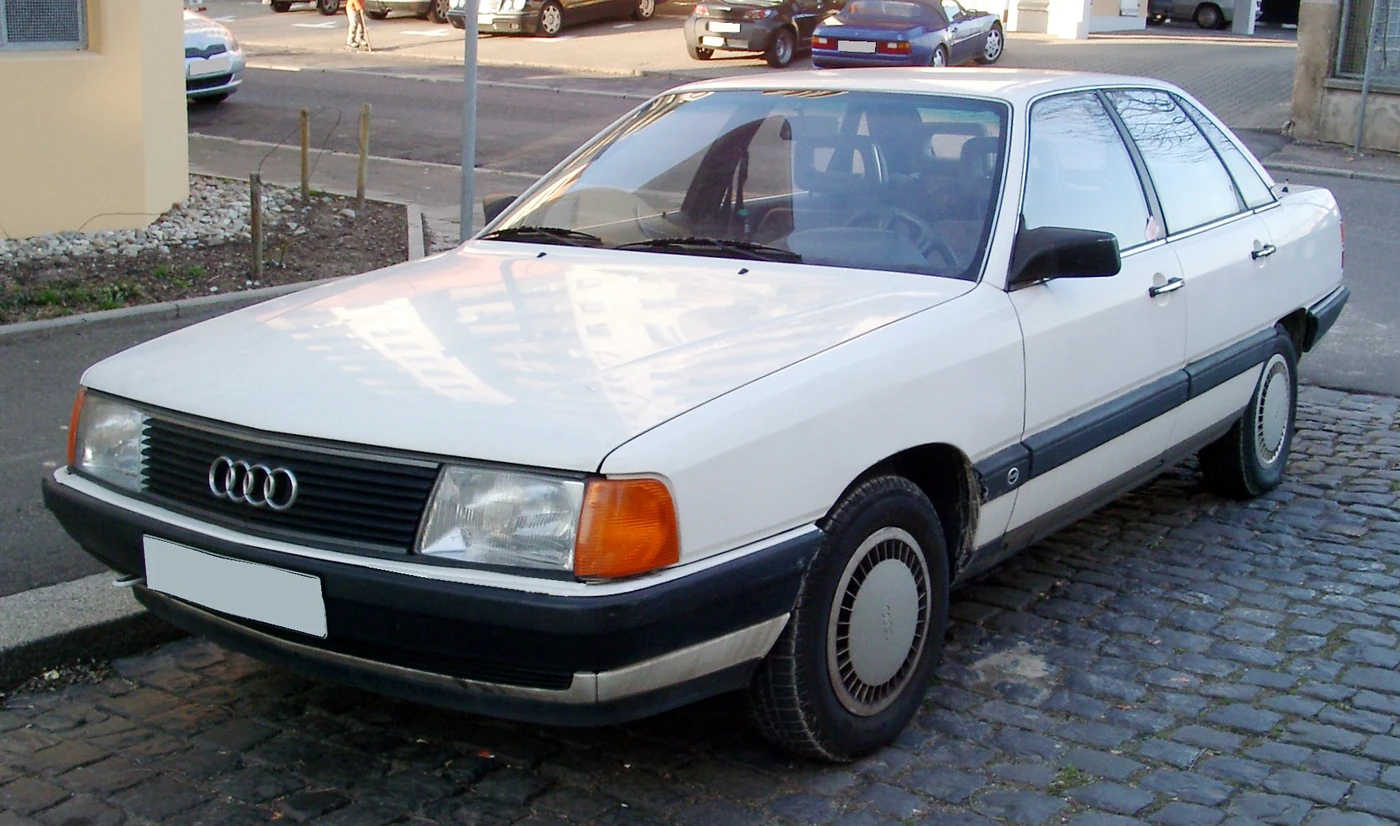 Audi 100 C3 sedan showing its sloping windshield and integrated body profile