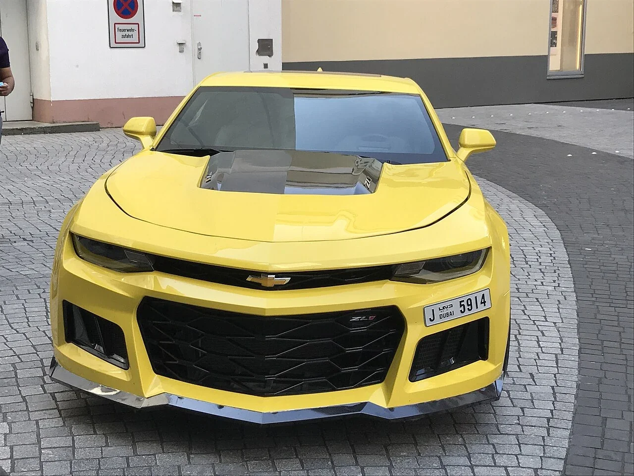 Yellow sixth-generation Camaro ZL1 viewed from the front