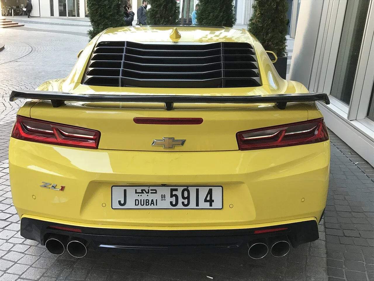 Yellow Camaro ZL1 rear with rear-window louvers