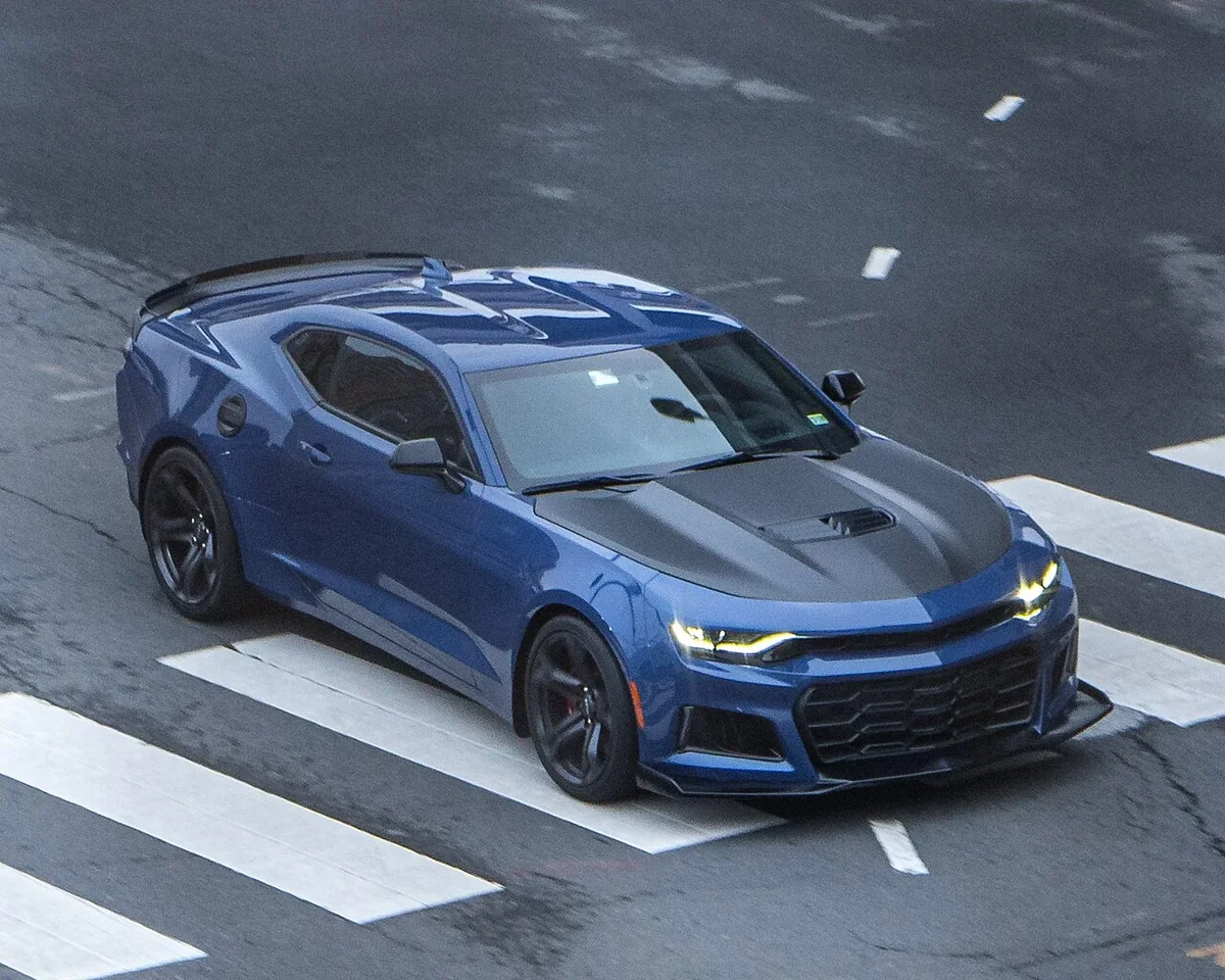 Blue sixth-generation Chevrolet Camaro ZL1 on a city street