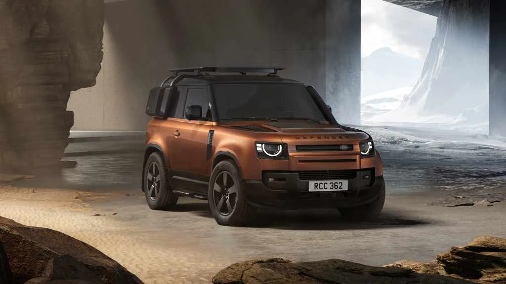 Land Rover Defender review image showing the current 2027 Defender 110 in Namib Orange
