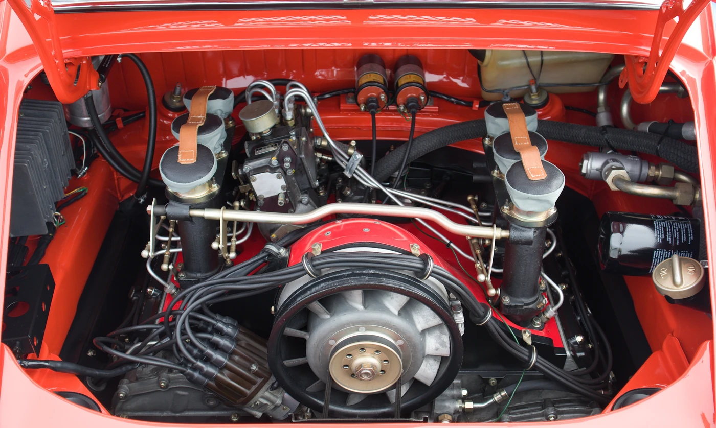Rear engine compartment of a restored 1971 Porsche 911ST with its air-cooled flat-six