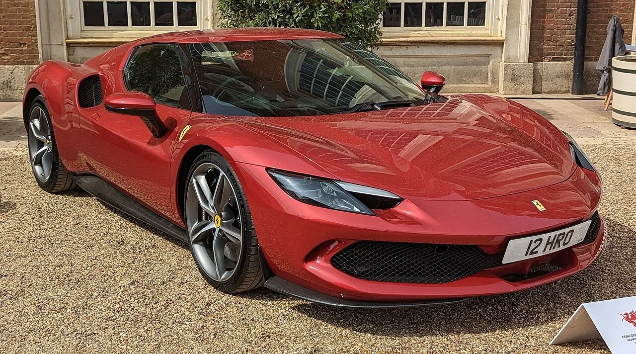 Red Ferrari 296 GTB front three-quarter view