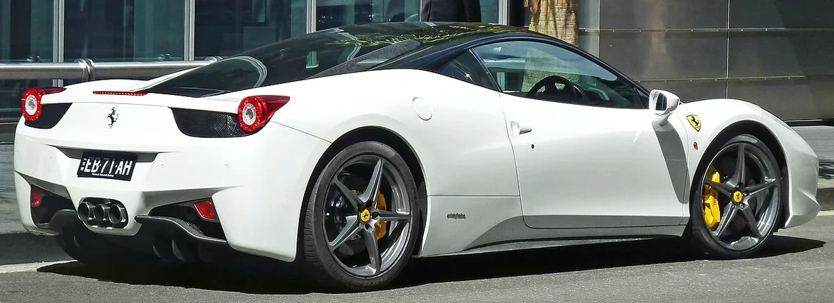 White Ferrari 458 Italia coupe rear view
