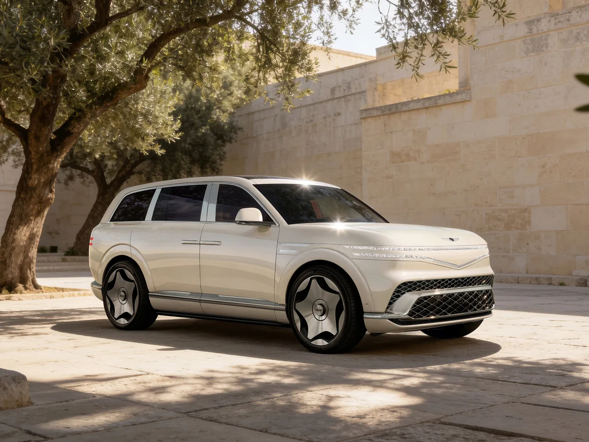 Genesis GV90 Review: white standard model viewed from the front three-quarter angle