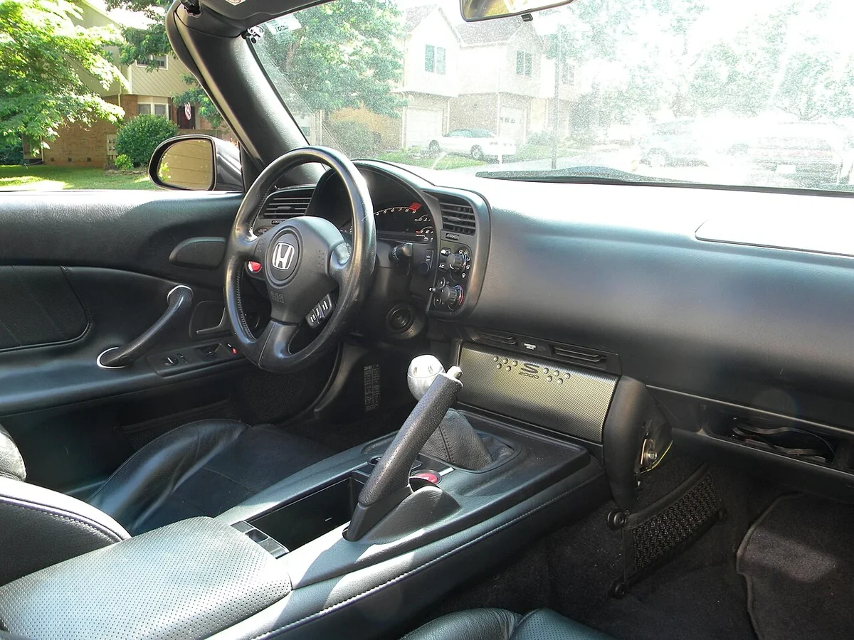 2007 right-hand-drive S2000 cabin shown as a layout reference; it does not establish U.S