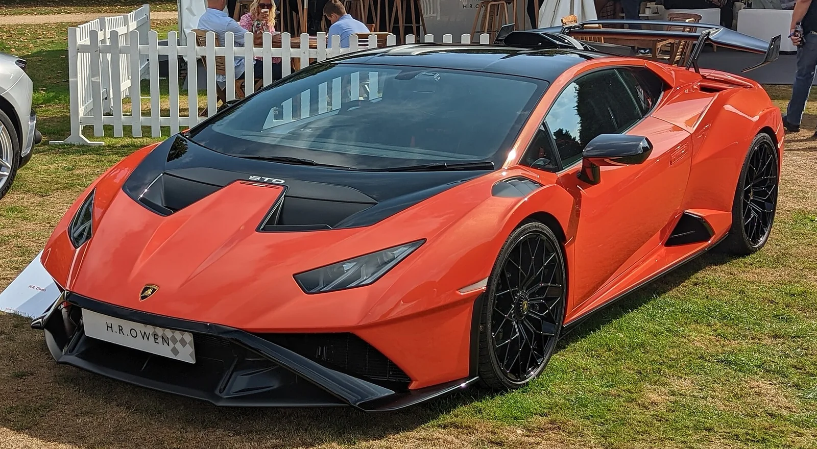 Orange Lamborghini Huracán STO front three-quarter view