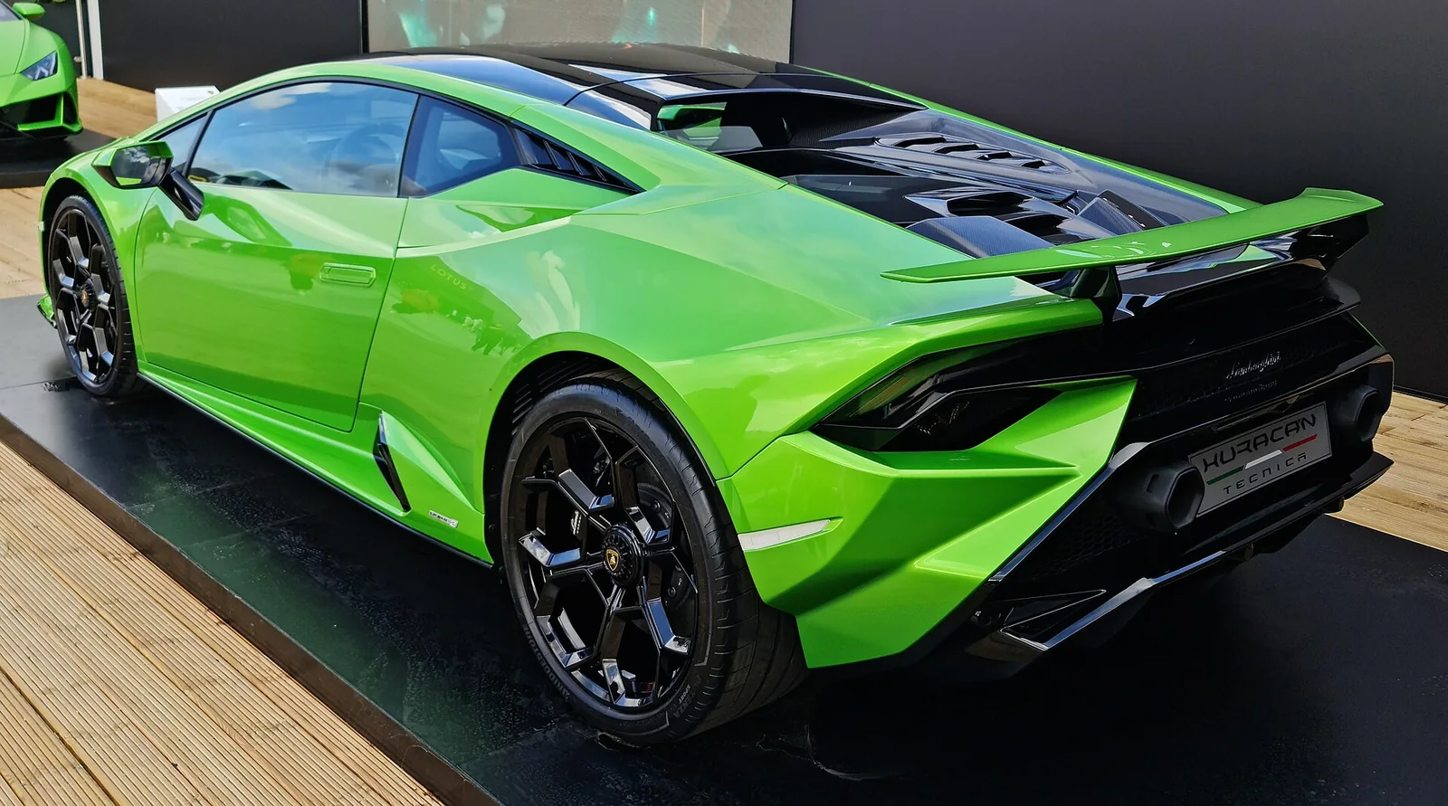 Green Lamborghini Huracán Tecnica rear three-quarter view