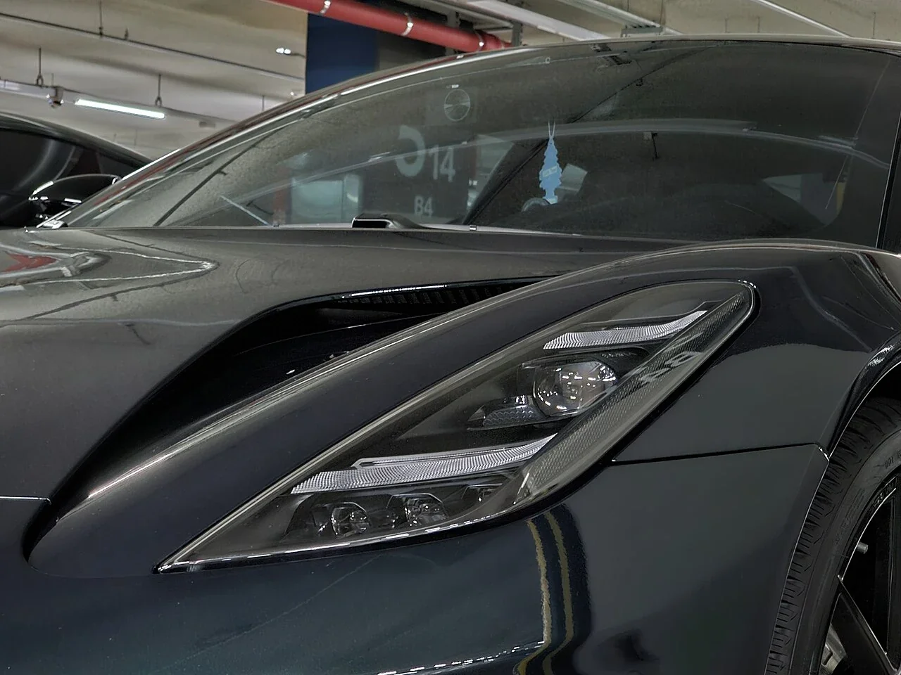 Lotus Emira front lamp and sculpted bonnet detail