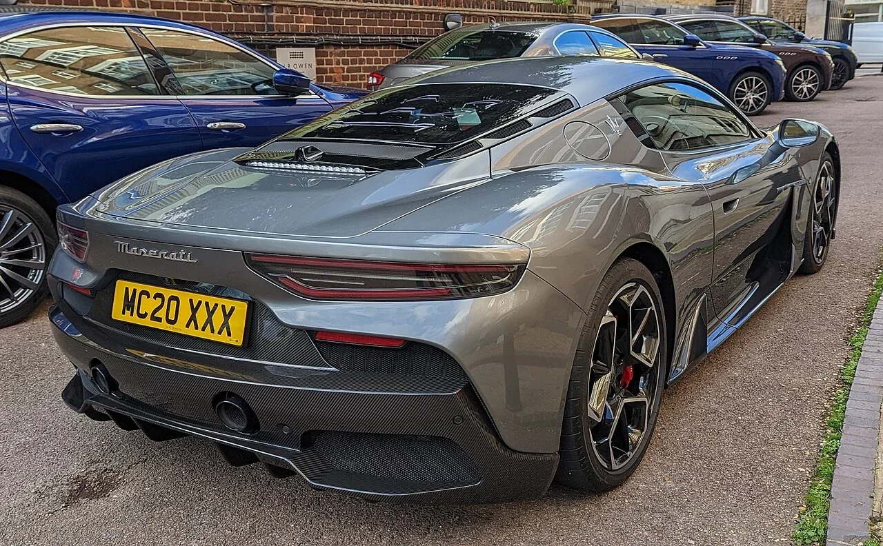 Silver original Maserati MC20 rear three-quarter