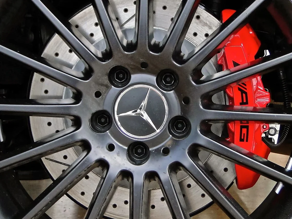 Mercedes C63 AMG coupe multi-spoke wheel and red brake caliper