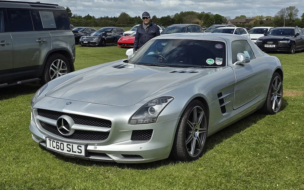 Original SLS AMG coupe: long hood and a cabin set well behind the front axle.