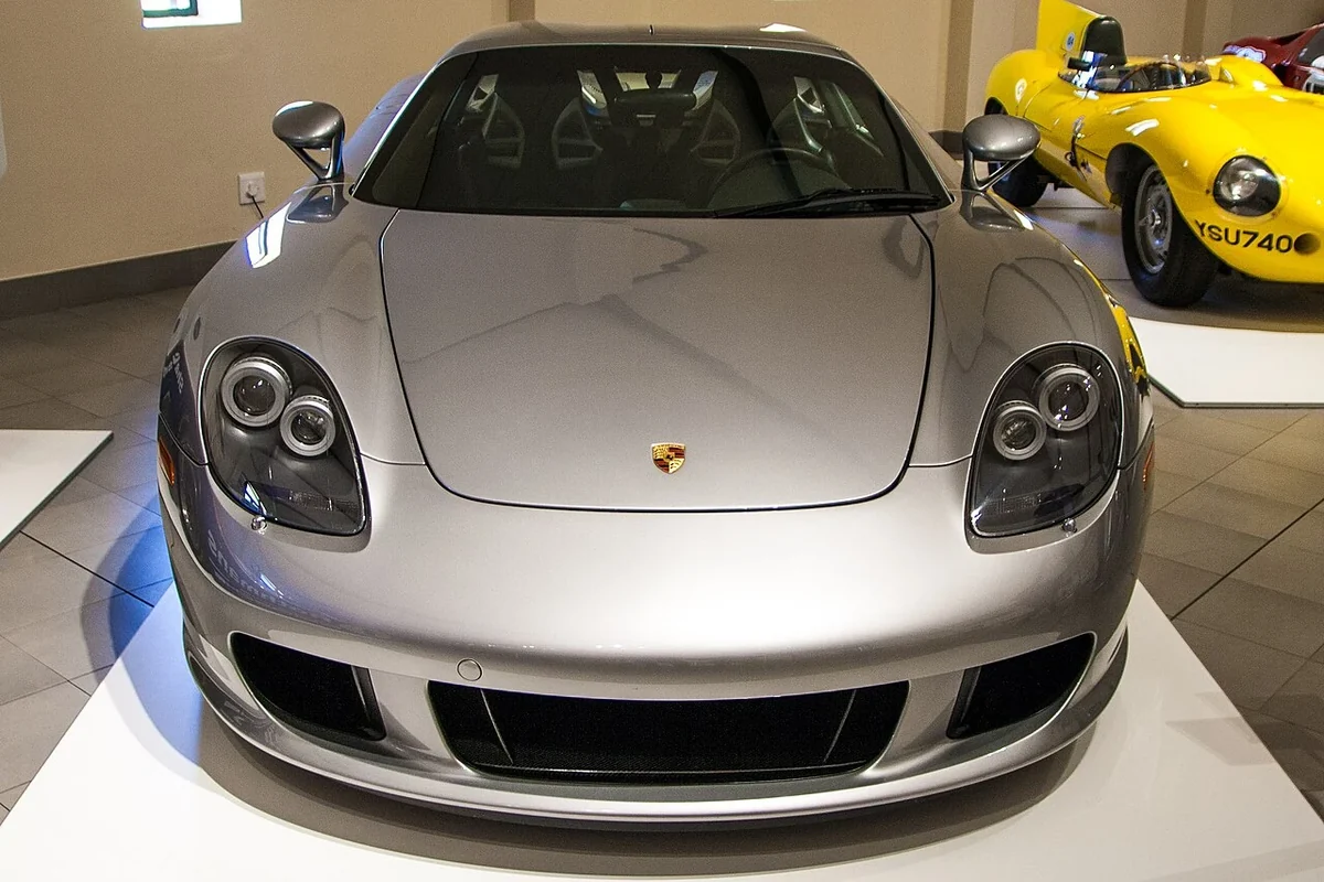 Silver Porsche Carrera GT front view indoors