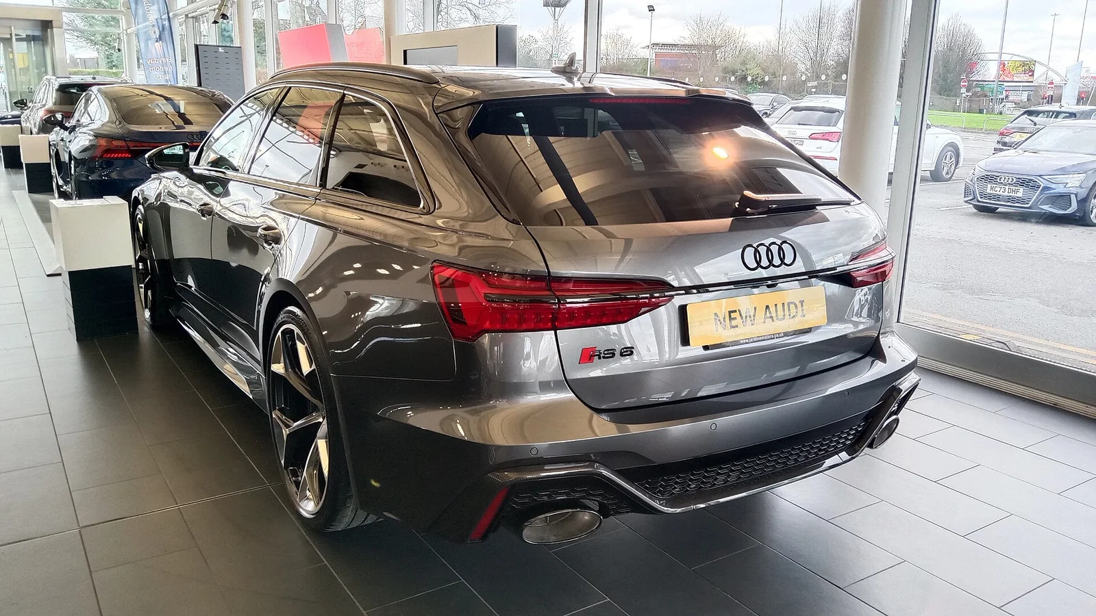 Audi RS 6 Avant rear view showing the cargo hatch and oval exhaust outlets