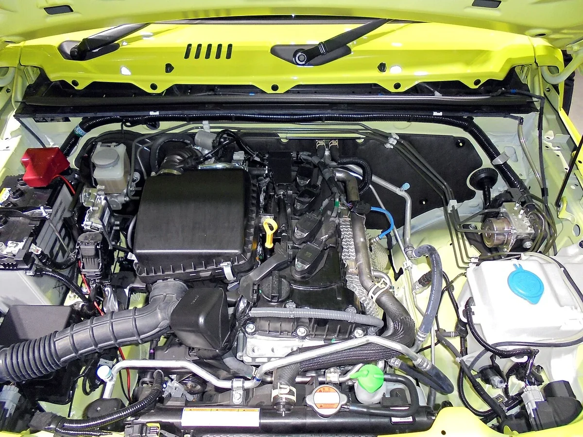K15B engine in a 2019 JB74 Jimny, distinct from the 660 cc Japanese JB64.