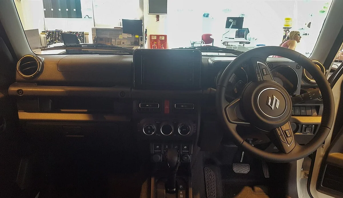 Right-hand-drive 2019 Jimny cabin; equipment varies by market and trim.