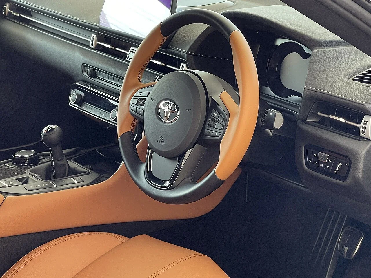 Toyota GR Supra RZ manual cockpit and steering wheel
