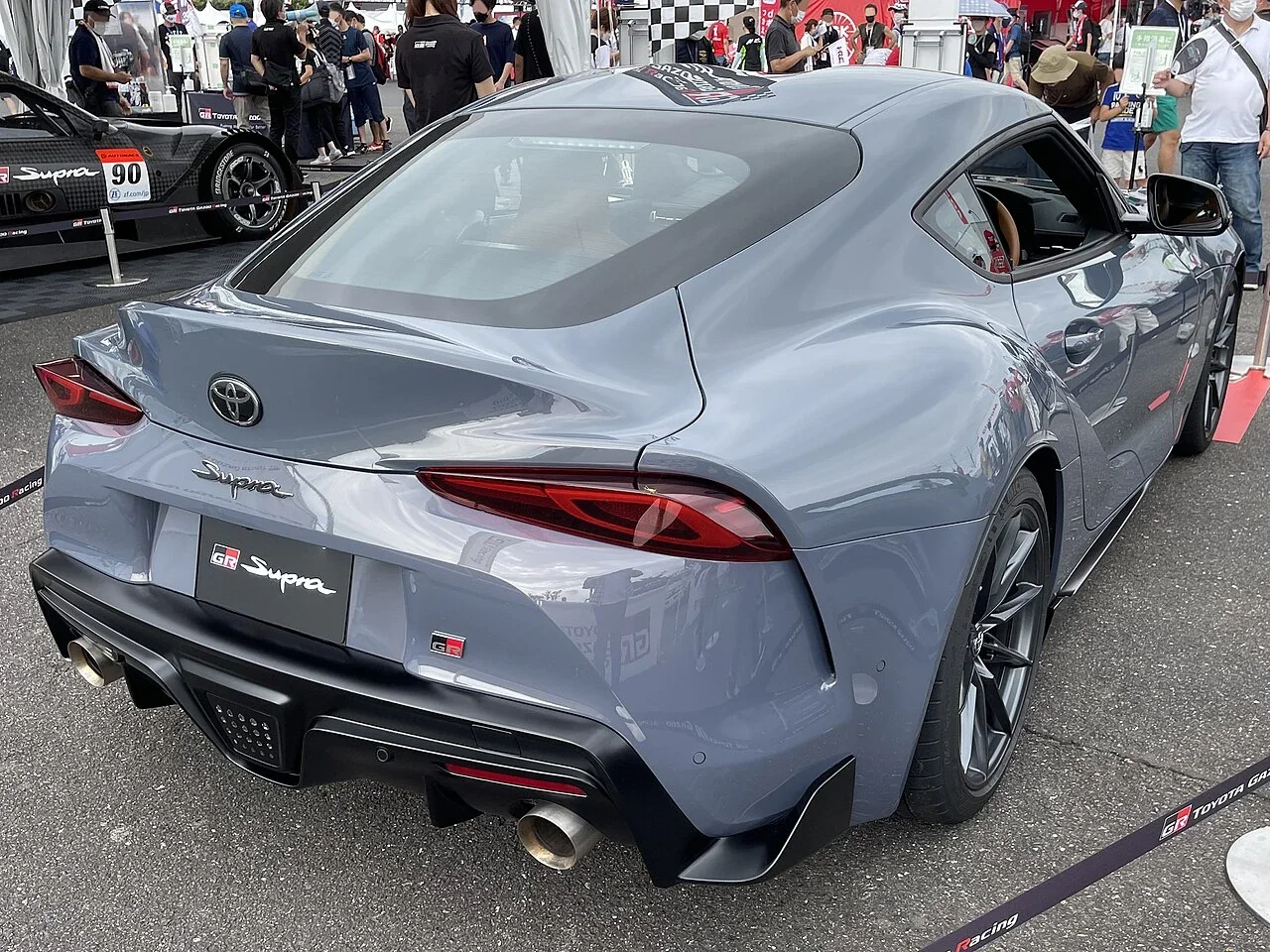 Grey Toyota GR Supra RZ 6MT rear three-quarter view