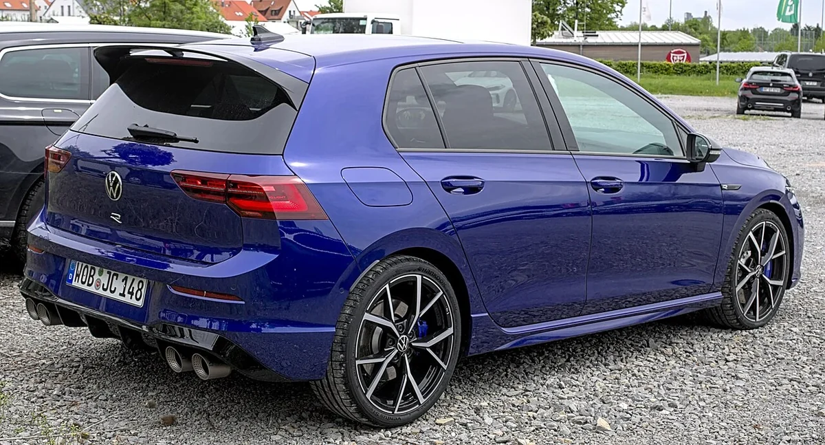 Blue Volkswagen Golf R Mk8 rear side view in Germany