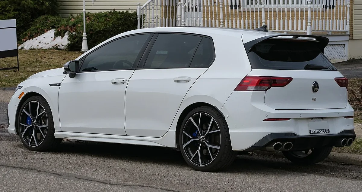 2022 Volkswagen Golf R in Pure White, rear three-quarter view