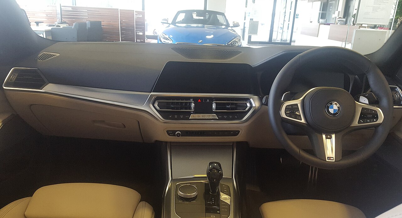 BMW 320d 2019 right-hand-drive dashboard and beige front seating
