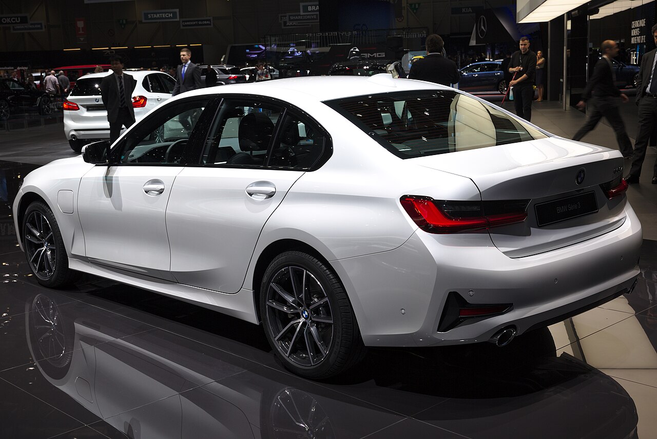 BMW 330e white 2019 rear three-quarter view