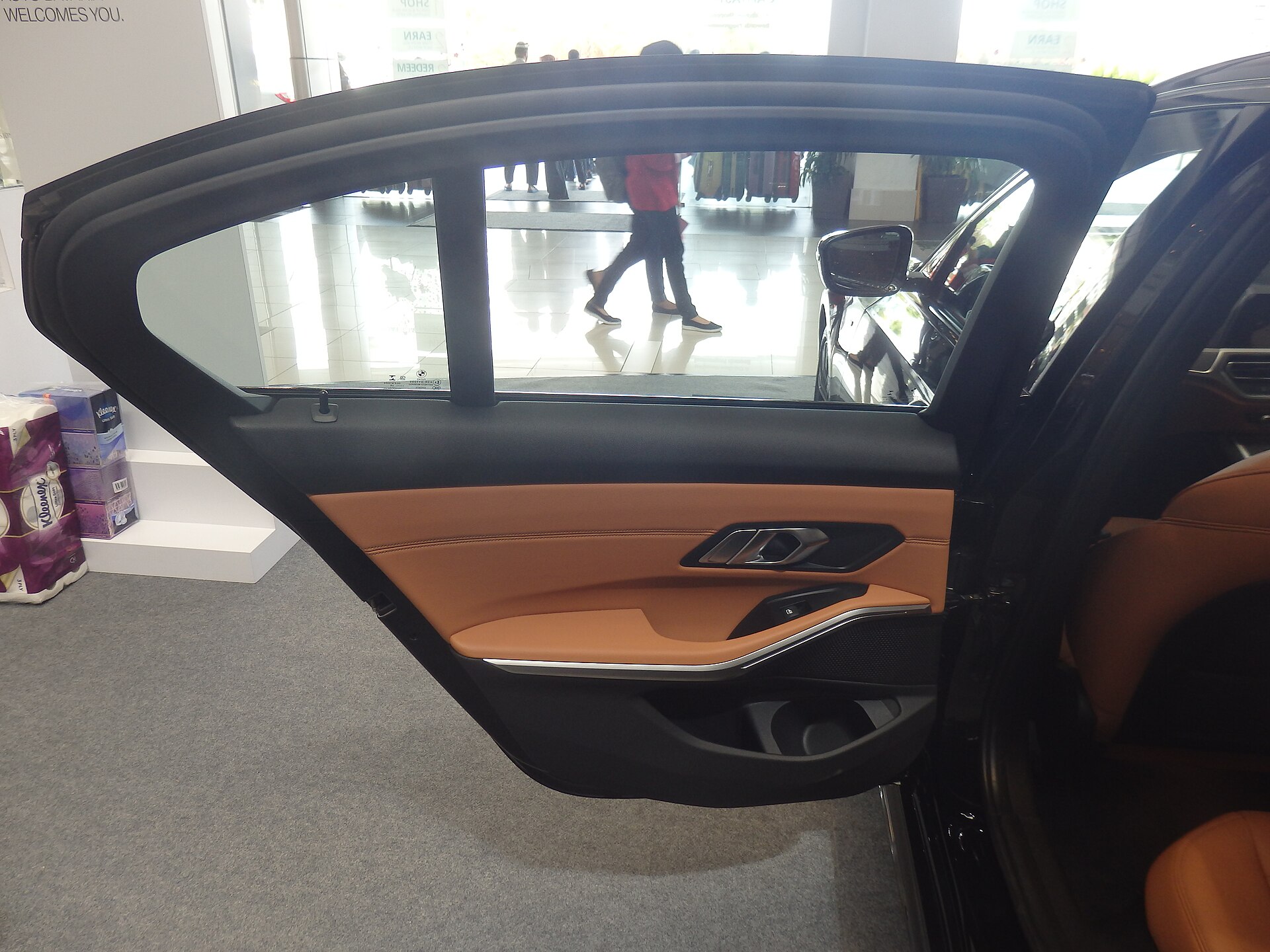 BMW 330i G20 black 2019 M Sport front door open, showing door trim