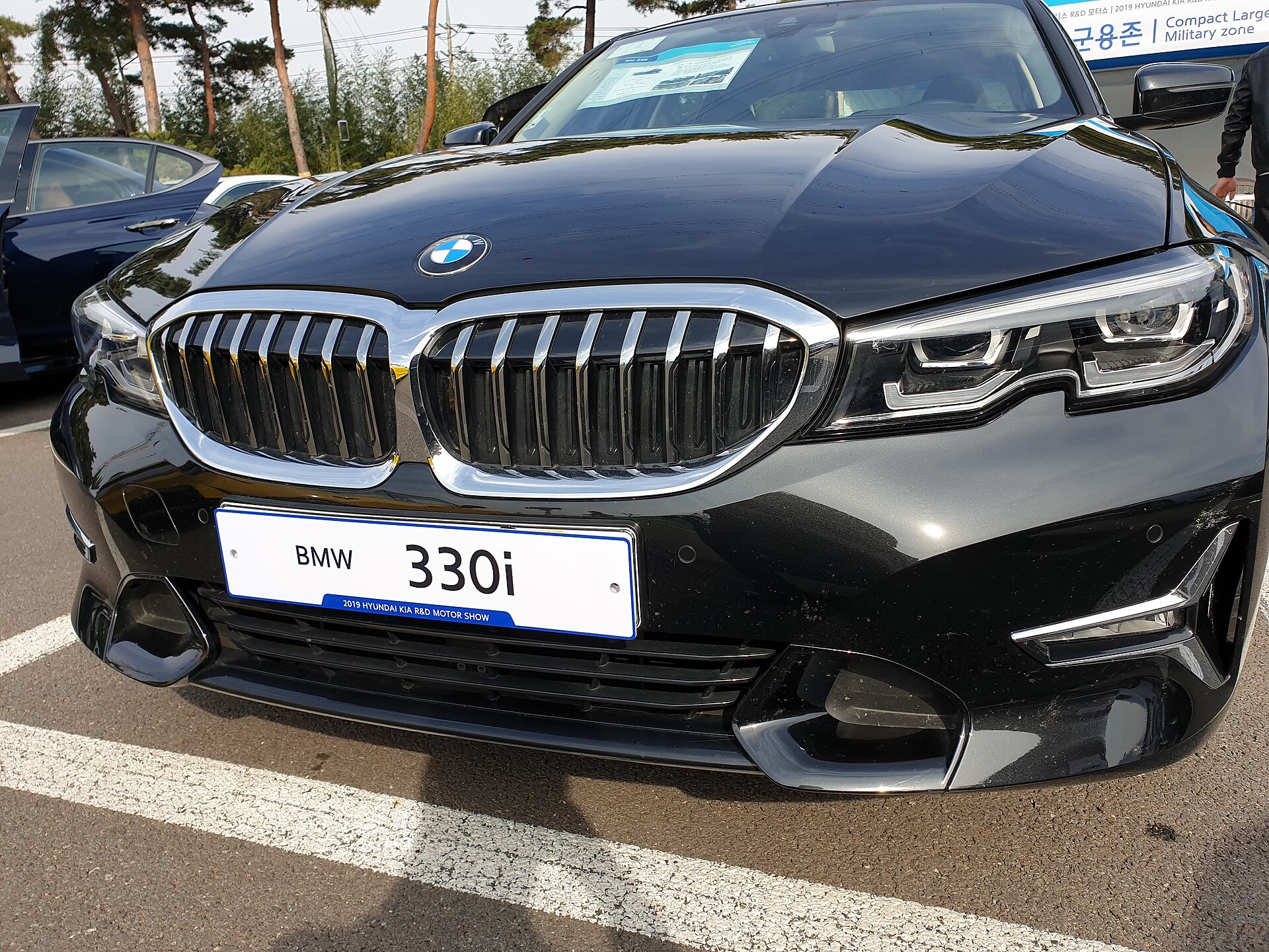 BMW 330i G20 black G20 Luxury Line front fascia detail outdoors