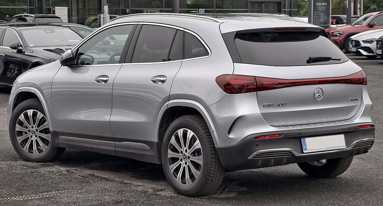 Mercedes-Benz EQA 300 4MATIC silver facelift AMG Line rear three-quarter view