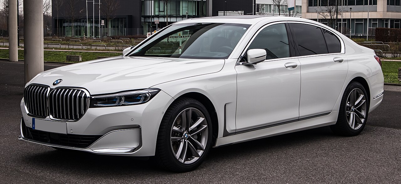 White facelift BMW 730d front three-quarter view