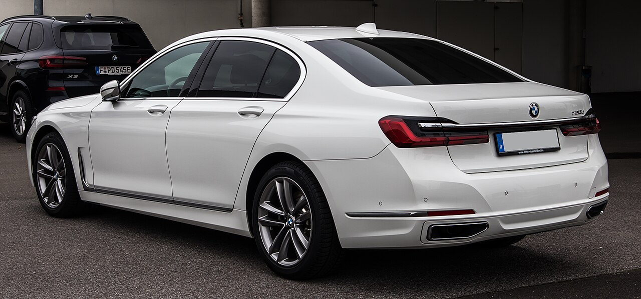 White facelift BMW 730d rear three-quarter view