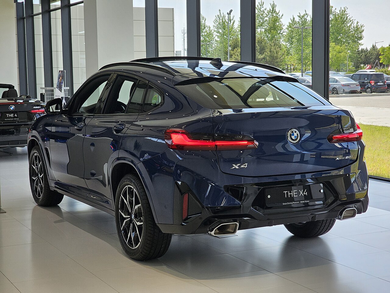 Blue BMW X4 xDrive20i G02 rear with badge